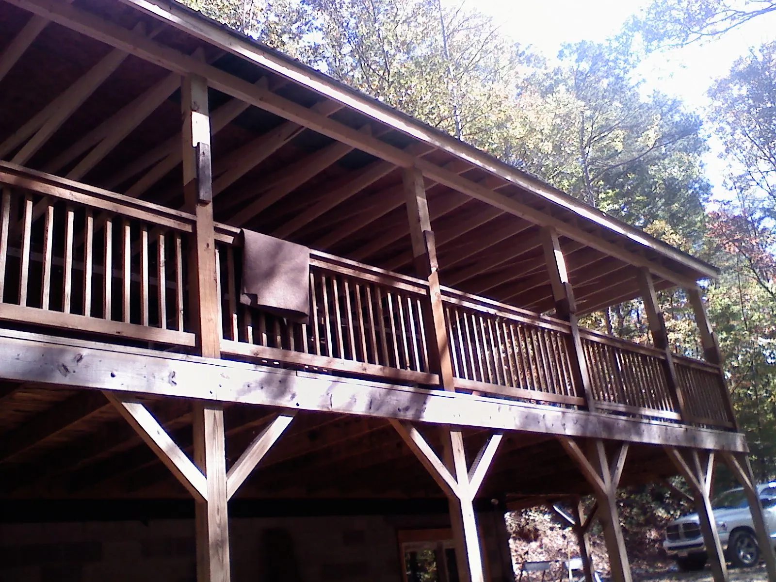 Timber framing under a new elevated porch and deck — Roof Leak Repair in Roanoke by Roofing Brothers